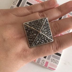 Silver ring with pewter rhinestones.